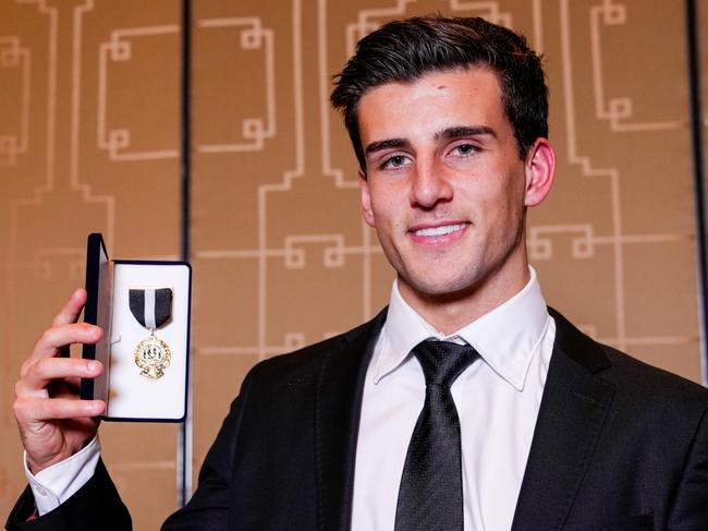 MELBOURNE, AUSTRALIA - OCTOBER 04: Nick Daicos poses for a photo after winning the E.W Copeland Trophy during the Collingwood Magpies Best And Fairest Awards at Crown Palladium on October 04, 2024 in Melbourne, Australia. (Photo by Asanka Ratnayake/AFL Photos/via Getty Images)