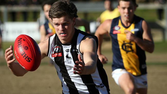 NFL: Montmorency’s Darcy Porter chases the ball. Picture: Hamish Blair