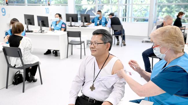 Bishop Vincent Long gets the Covid-19 vaccine at the Vaccination Hub at Sydney Olympic Park. Picture: NCA NewsWire / Jeremy Piper