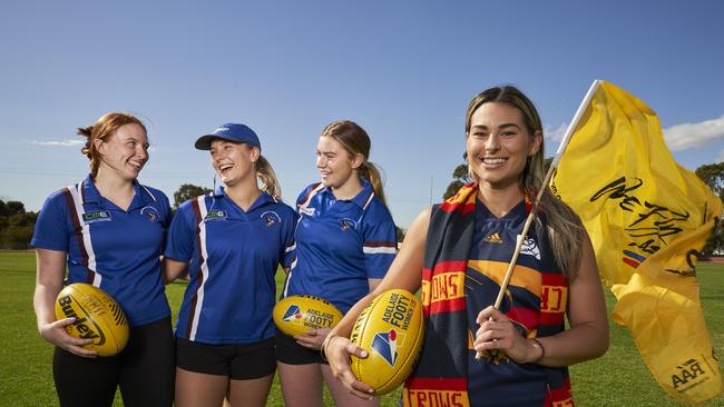 Emmie Hawkes, Emilie Haslerm, Tess Hawkes, and Christina Lena are excited for free entry to the AFLW grand final. Picture: Matt Loxton