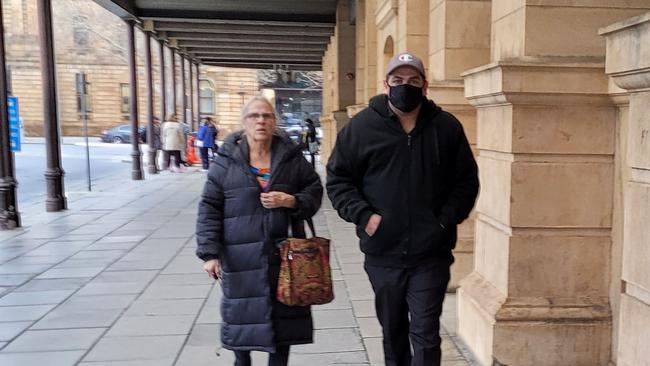 Haydn John Sansbury leaves the Supreme Court with a supporter. Picture: Jordanna Schriever