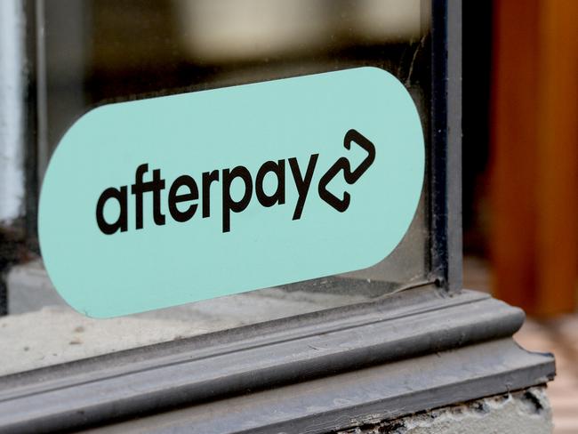 MELBOURNE, AUSTRALIA - NewsWire Photos APRIL 30, 2021: Stock Image of Afterpay logo in a shop window on Little Collins Street, Melbourne. Picture: NCA NewsWire / Andrew Henshaw