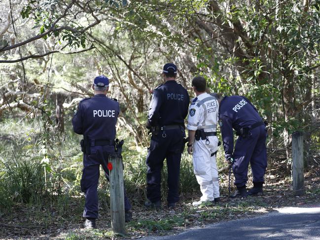 Police searching bushland along Tallow Beach Rd in the Arakwal National Park. Picture: Liana Turner