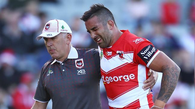 Paul Vaughan is helped from the field after injuring his leg against the Warriors. Picture: Getty