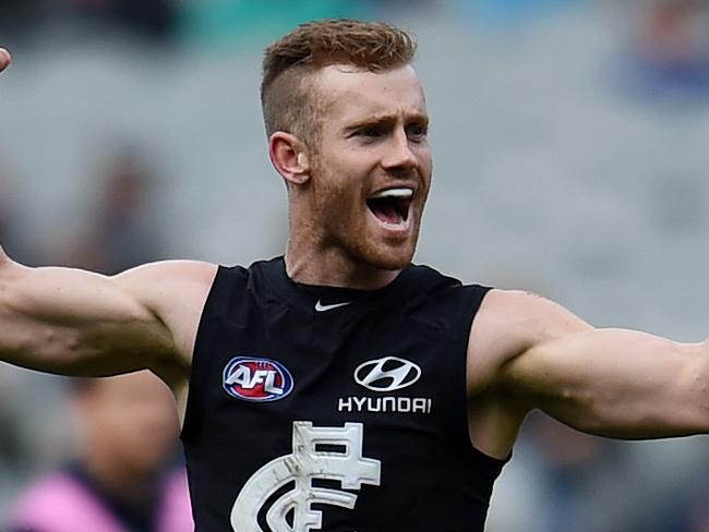 Nick Graham of the Blues scores a goal during the round 22 AFL match between the Carlton Blues and the Melbourne Demons at the MCG in Melbourne, Saturday, Aug. 21, 2016. (AAP Image/Tracey Nearmy) NO ARCHIVING, EDITORIAL USE ONLY