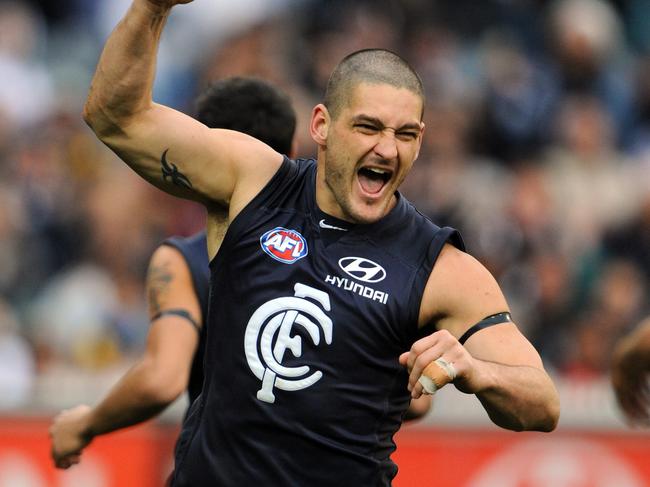 AFL Football - Carlton vs Richmond match at the MCG. Footballer Brendan Fevola snaps his third goal 11 Jul 2009.