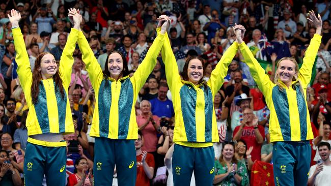 Mollie O’Callaghan, Lani Pallister, Brianna Throssell and Ariarne Titmus celebrate victory in the 4x200m freestyle relay. Picture: Getty Images