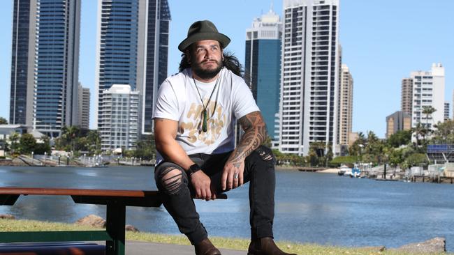 Maudsland man Jayson Huthmann after sharing a congratulatory beer with Mayor Tom Tate at HOTA Cafe after crash tacking a car thief at Labrador. Picture Glenn Hampson