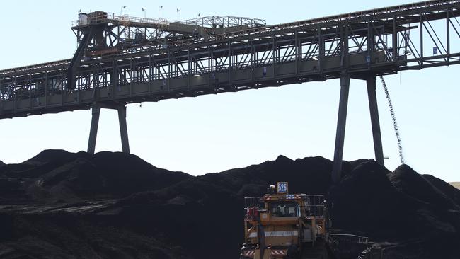 Coal in huge piles being prepared for the Liddell power station. Picture: David Swift