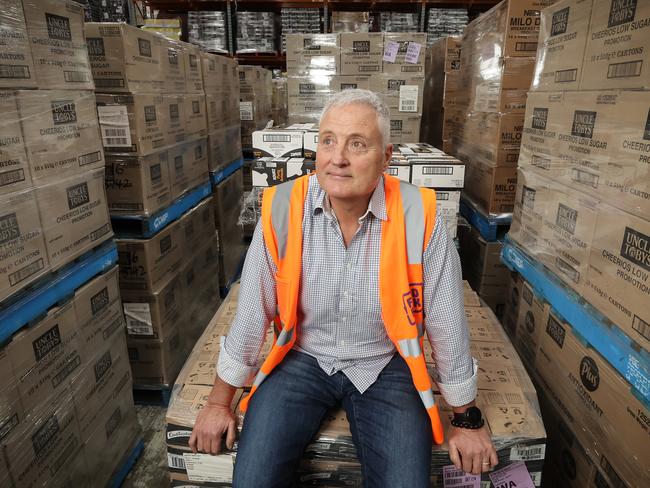 Big V Interview. David McNamara CEO of Foodbank in Victoria. David McNamara CEO with donated food stocks in the warehouse.                  Picture: David Caird