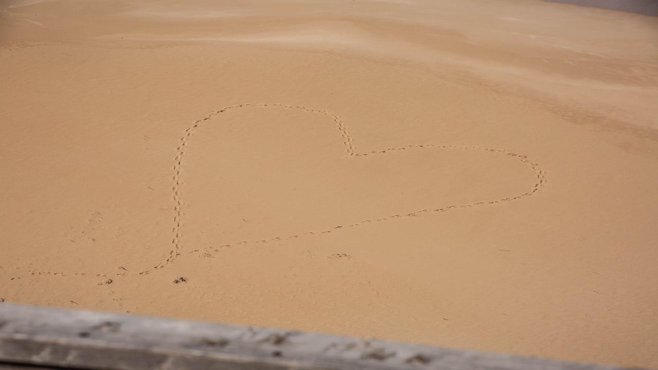 A heart drawn on the sand at Ethel Beach. Picture: NCA NewsWire / Ben Clark