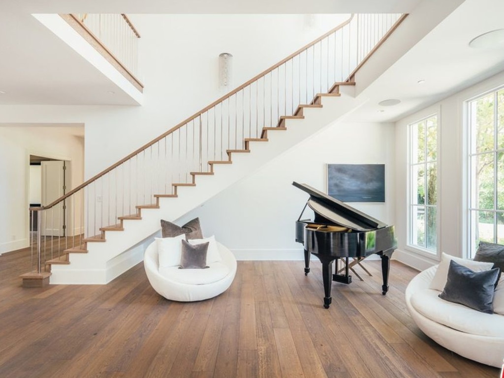 Space to practice new tunes on the grand piano in the hallway. Picture: Realtor