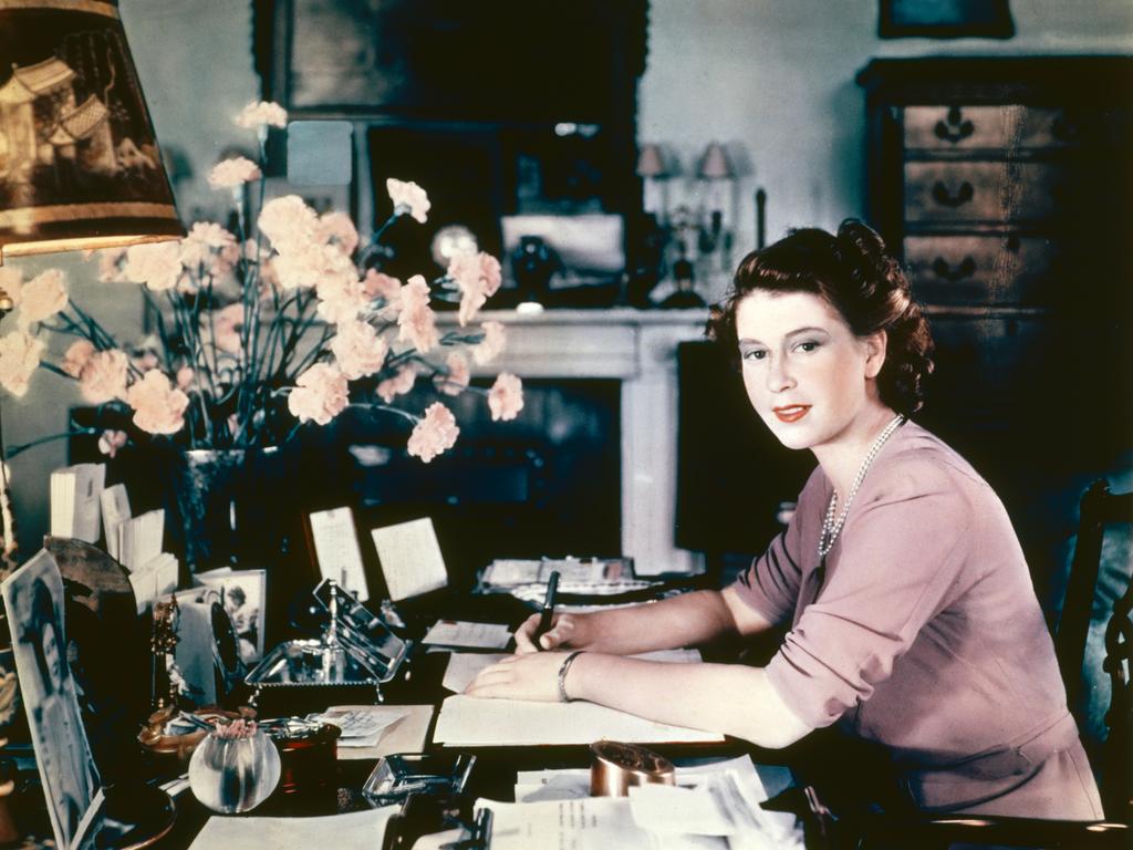 The future Queen at her desk in her sitting room at Buckingham Palace in 1946. Picture: Hulton Archive/Getty