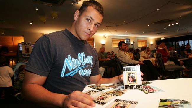 Schapelle Corby's half brother James Kisina, aged 17, holds up a ‘Schapelle Innocent’ flyer. Picture: Donna Cosford