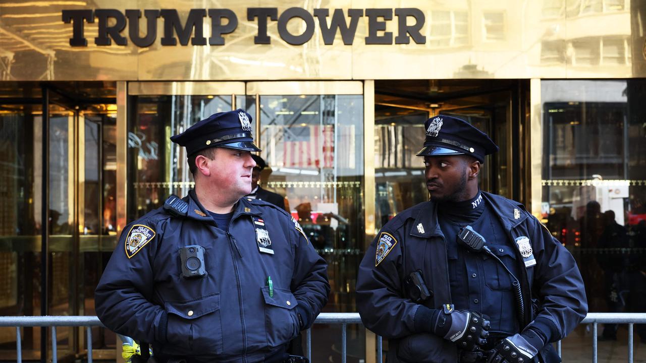 NYPD officers stand guard outside Trump Tower on March 21. Picture: Michael M. Santiago/Getty Images via AFP