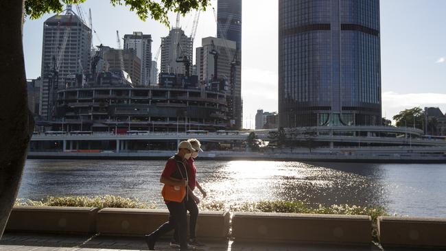 People wear masks at Southbank in Brisbane ahead of the city’s three-day snap lockdown beginning tonight. Picture: Jono Searle/Getty Images