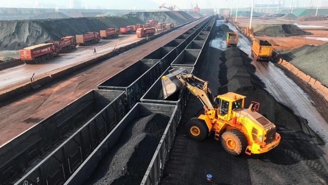 Coal being loaded onto train carriages at the coal terminal of Lianyungang Port in China's eastern Jiangsu province. Picture: AFP