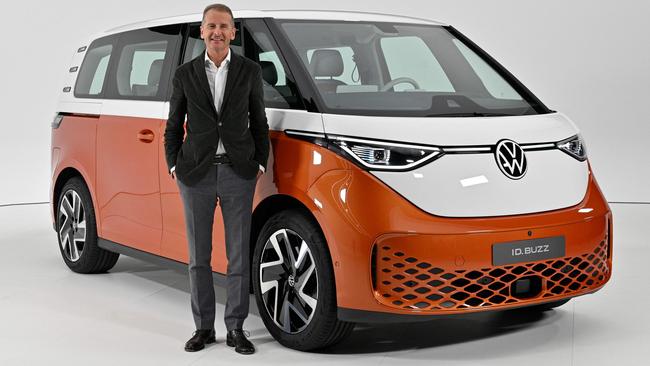 Departed VW chief executive Herbert Diess poses with the Volkswagen ID Buzz electric van during its presentation in Hamburg, northern Germany. Picture: AFP