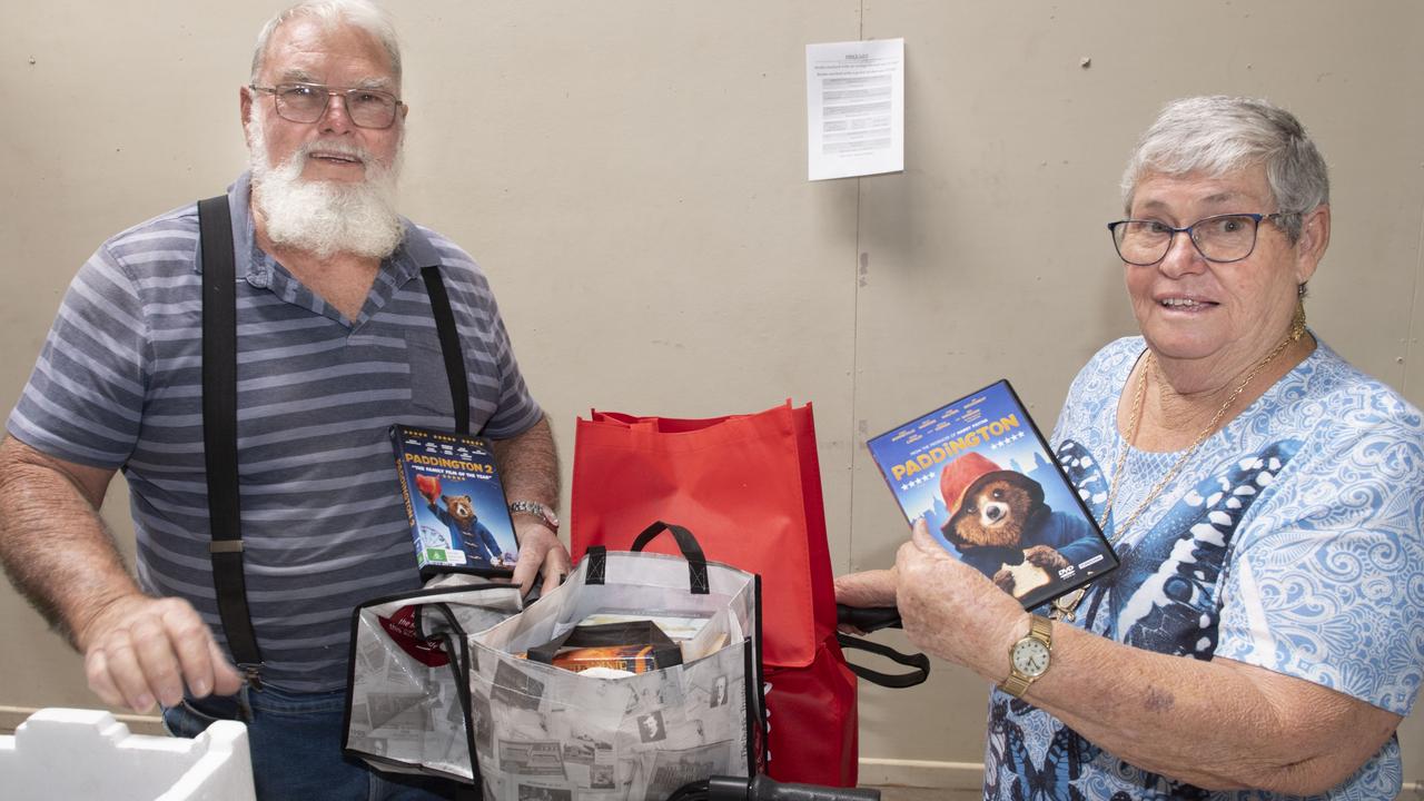 Tom and Pat McKay have an extra load of books and DVDs to take home to St George after visiting the Lifeline BookFest. The Chronicle Lifeline BookFest at Toowoomba Showgrounds. Saturday, March 4, 2023. Picture: Nev Madsen.