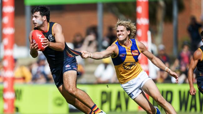 Fogarty tries to evade Callum Jamieson, with the young Crow elevated into the leadership group in 2024. Picture: Mark Brake/Getty Images.