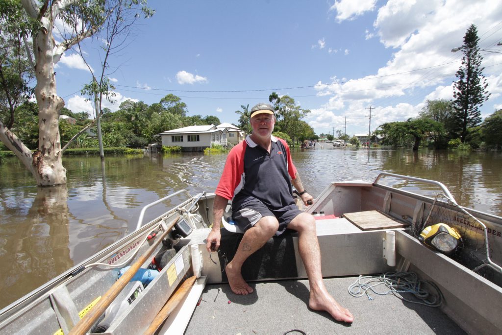 Michael Edwards from Tinana helping out his neighbours that are stranded. Robyne Cuerel/ Fraser Coast Chronicle. Picture: Robyne Cuerel