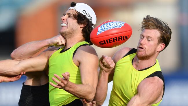 Riley Grundy, left, and Tom Jonas of Port Adelaide train at Alberton Oval in Adelaide on Tuesday. Picture: AAP