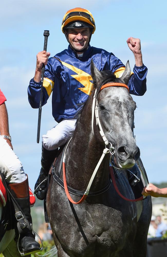 Dwayne Dunn celebrates his amazing win aboard Chautauqua. Picture: Getty Images