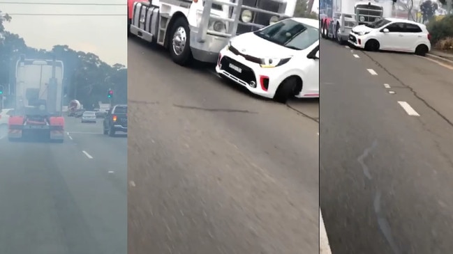 Stills from a viral video which shows a truck and car colliding in Smithfield. Pictures: Only in Guildford