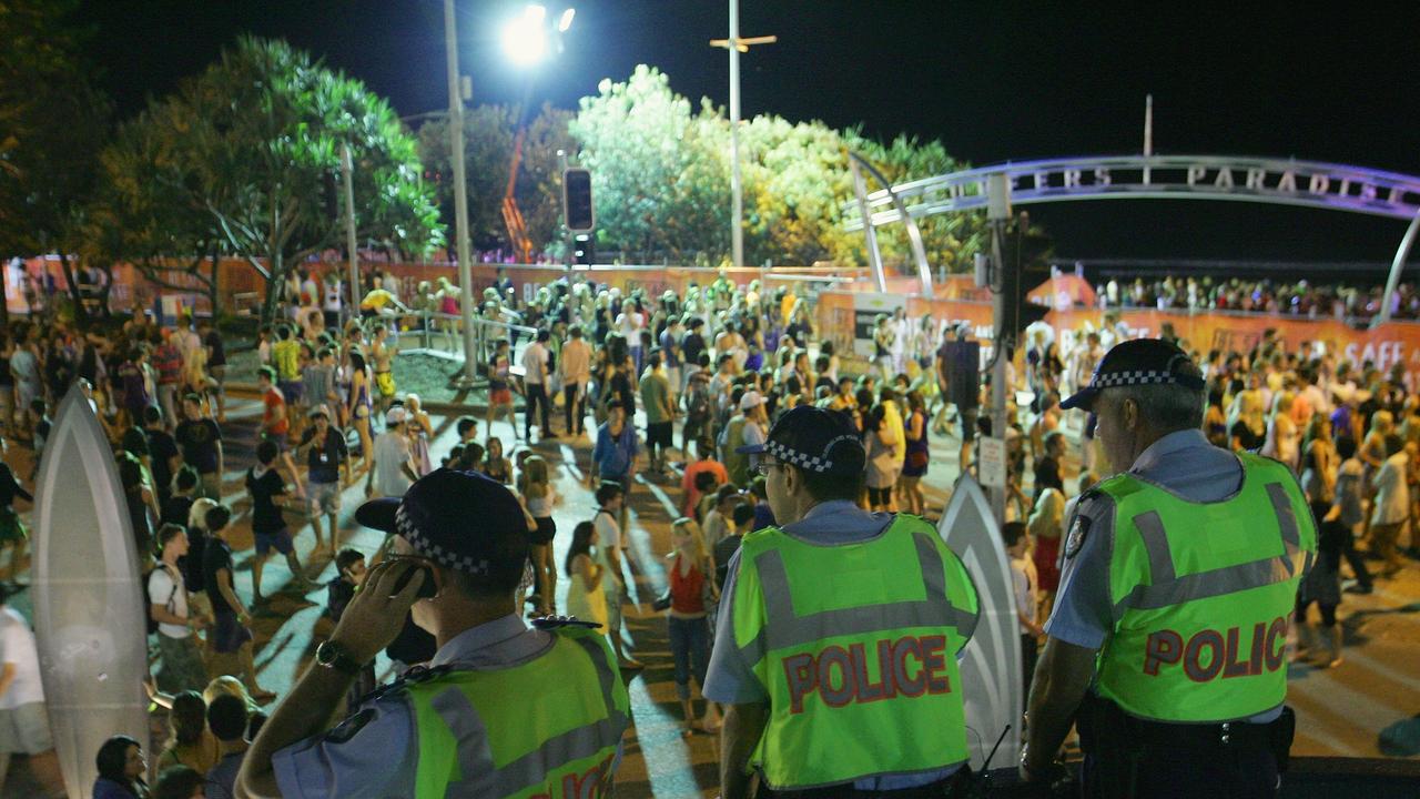 Police watch over Schoolies celebrations in Surfers Paradise. Pic: Sergio Dionisio/Getty Images