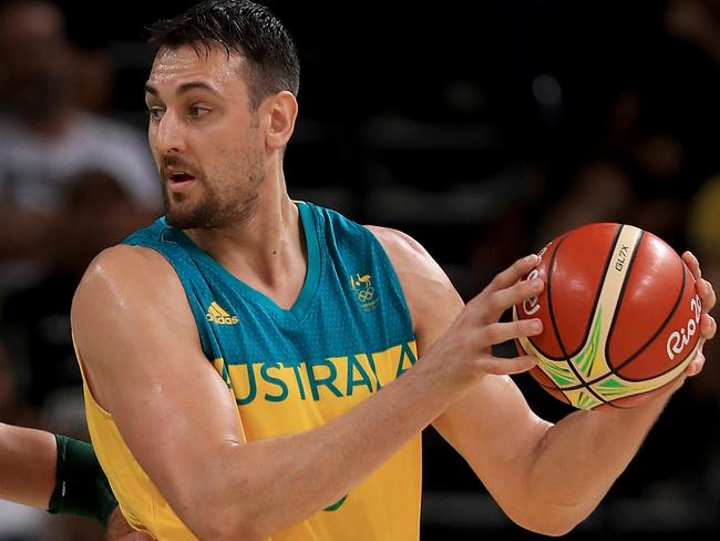 RIO DE JANEIRO, BRAZIL - AUGUST 17: Andrew Bogut #6 of Australia looks to pass against Jonas Valanciunas #17 of Lithuania during the Men's Quarterfinal match on Day 12 of the Rio 2016 Olympic Games at Carioca Arena 1 on August 17, 2016 in Rio de Janeiro, Brazil. (Photo by Mike Ehrmann/Getty Images)