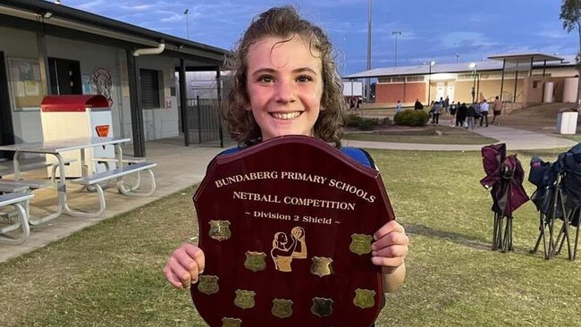 11-year-old Dakota Blackley holds the shield the Avoca State School team won in their very first finals win.