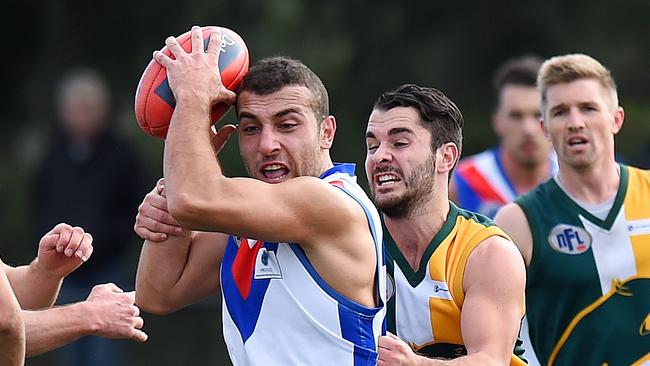 West Preston-Lakeside's Khodr Waari evades Northcote Park's Lachlan Boscarini. Picture: Josie Hayden.