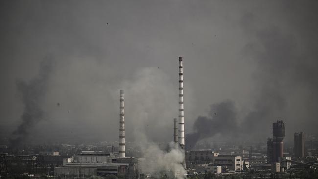 Smoke and dirt rise from the city of Sievierodonetsk during fighting between Ukrainian and Russian troops. Picture: ARIS MESSINIS / AFP