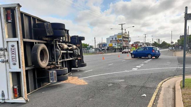 SMASH: A truck has landed on it's side after a crash on the corner of Bourbong St and Burrum St this morning. Picture: Toni Benson-Rogan