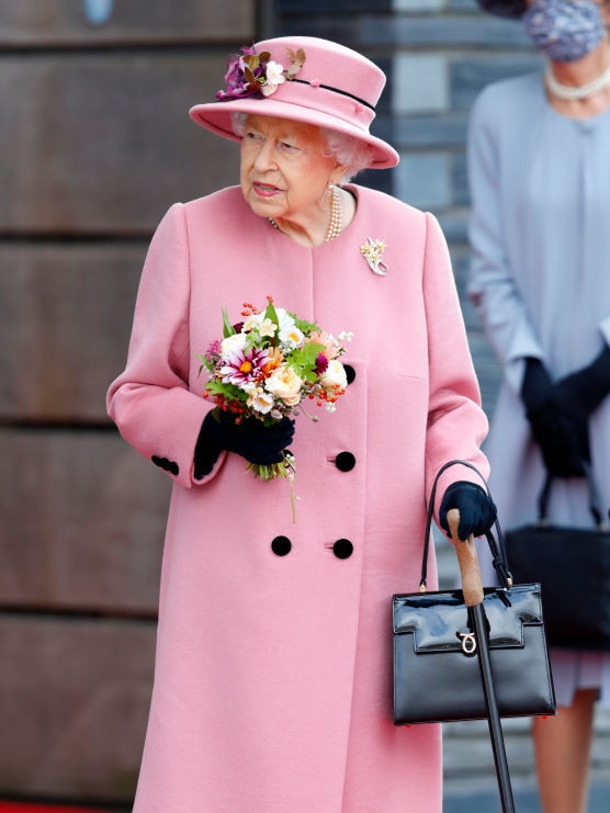 The Queen was seen once again relying on her cane in October this year, just before her hospital stay. Picture: Max Mumby/Indigo/Getty Images.