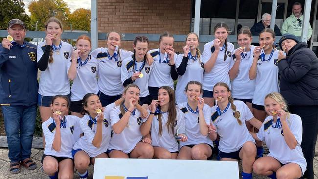 Front (left to right): Milla Zorzo, Coco Zorzo, Maya McGrath, Piper Coote-Parker, Lauren McFadden, Hayley Marshall and Hollie Matthews. Back: Coach Peter Everingham, Emily Hart, Sienna Ambler, Laura Parsons, Shailyn Gooley, Gigi Zorzo, Lainie Glover, Jessica Williams, Erin Williams, Maria Mitchell and Jenna Lidbetter (coach).