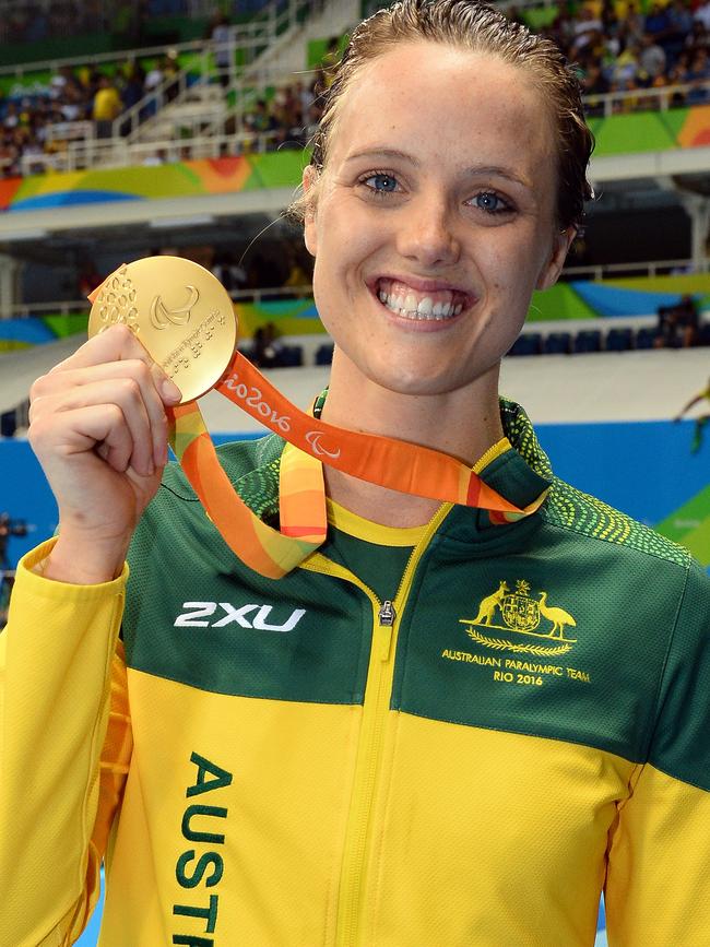 Ellie Cole with her gold medal in the Women's 100m Backstroke S9 Final.