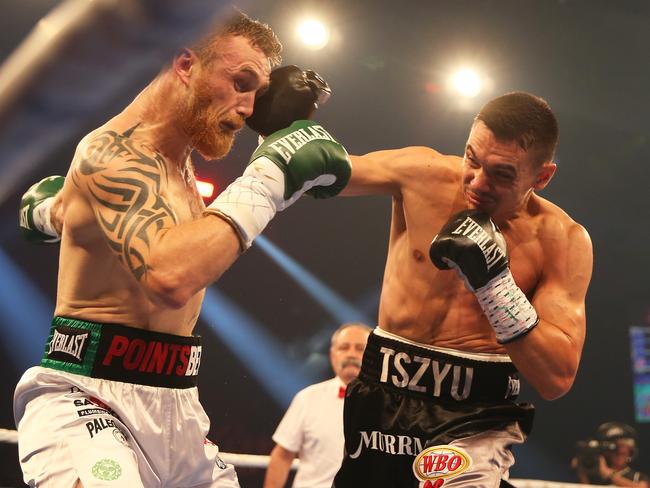 NEWCASTLE, AUSTRALIA - NewsWire Photos - March 31, 2021. Action from the Tim Tszyu v Dennis Hogan Steel City Showdown at Newcastle Entertainment Centre.  Picture: NCA NewsWire / Peter Lorimer.