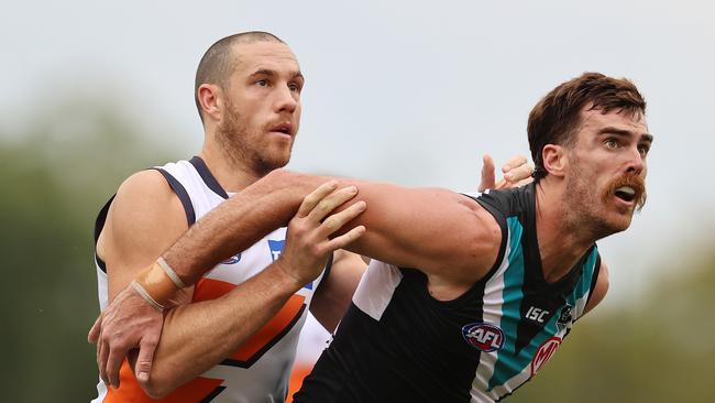 Ruckmen Shane Mumford and Scott Lycett do battle. Picture: Michael Klein