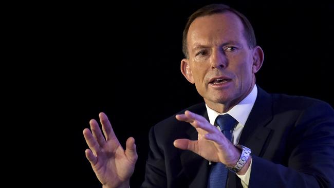 Former Australian Prime Minister Tony Abbott responds during a question and answer session after delivering a lecture at the Fullerton Hotel in Singapore on Wednesday, Dec. 9, 2015 (AP Photo/Joseph Nair)