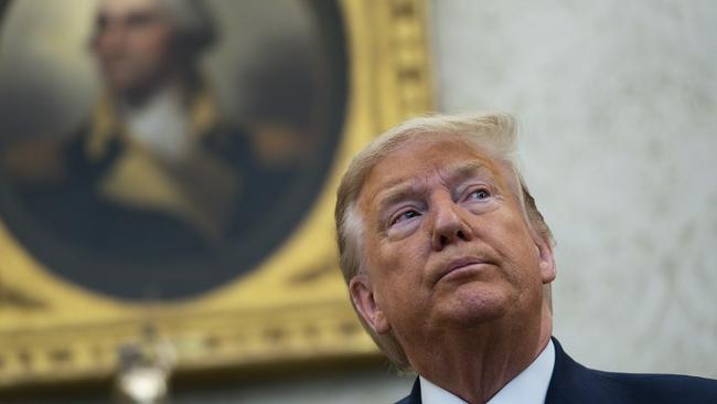 President Donald Trump in the Oval Office of the White House on March 12. Picture: AP