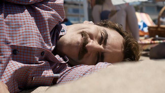 Joaquin Phoenix as Theodore in the modern day love story film "Her".