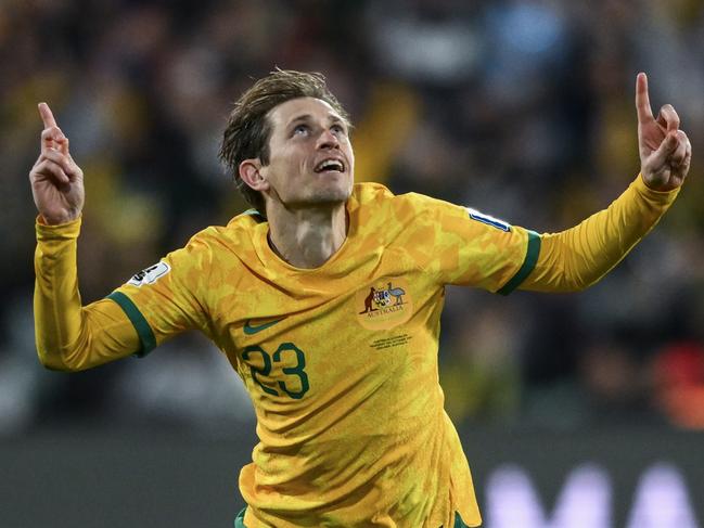 ADELAIDE, AUSTRALIA - OCTOBER 10: Craig Goodwin of the Socceroos   celebrates after scoring his teams second goal  during the third round FIFA World Cup 2026 Qualifier match between Australia Socceroos and China PR at Adelaide Oval on October 10, 2024 in Adelaide, Australia. (Photo by Mark Brake/Getty Images)