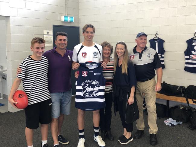 Broadbeach Cats player Aiden Fyfe and his family after being presented his guernsey ahead of his QAFL debut. Picture: Supplied.