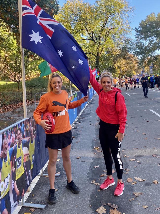 Waving the flag at the New York City Marathon.