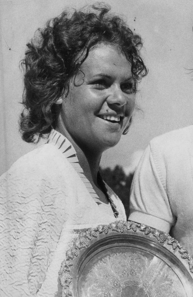 Evonne Goolagong collects a tennis trophy in 1972.