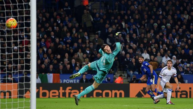 Riyad Mahrez of Leicester City runs off in celebration after grabbing his team's second goal against Chelsea.