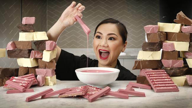 Head chocolatier Connie Yuen gets stuck into some ruby chocolate at the Kit Kat Chocolatory in Melbourne Central. Picture: David Caird