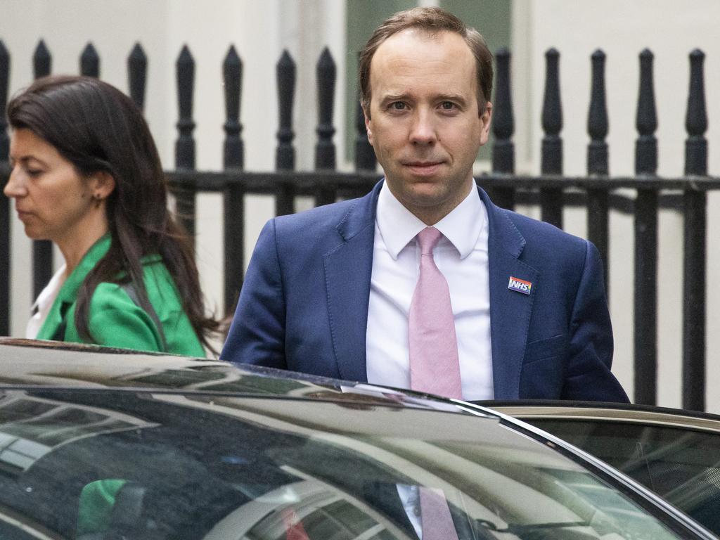 Mr Hancock and his aide Ms Coladangelo outside Downing Street in 2020. Picture: Dan Kitwood/Getty Images)