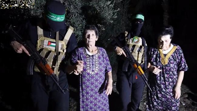 Yocheved Lifshitz and Nurit Cooper (also known as Nurit Yitzhak) who were held hostages by Palestinian Hamas militants, are released by the militants, in this video screengrab. Source: Twitter